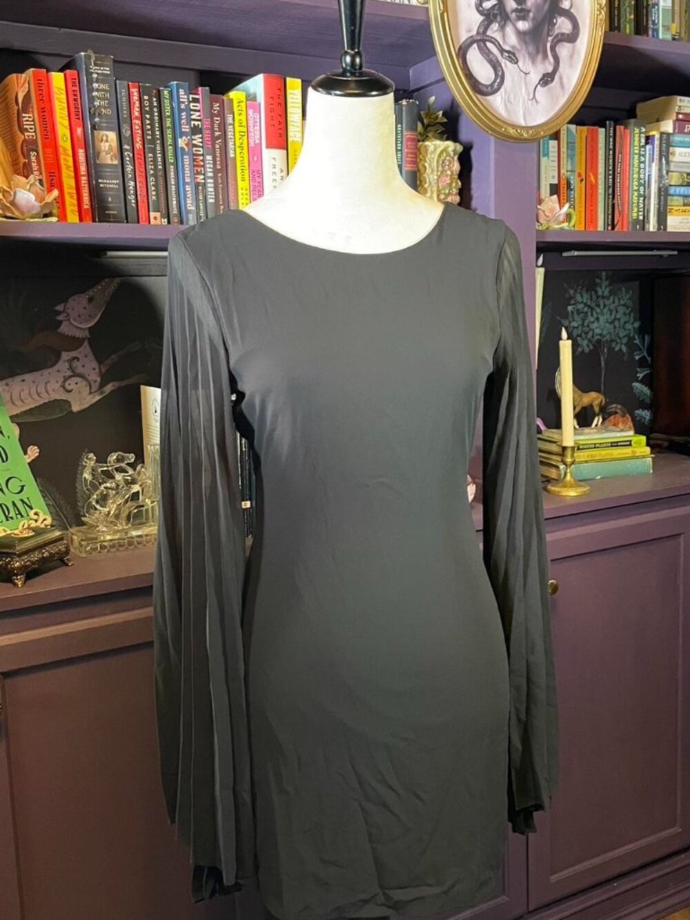 Black gothic cocktail dress with dramatic sheer bell